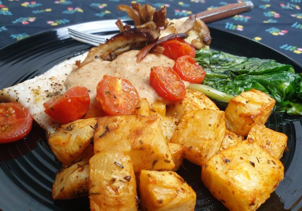 geroosterde knolselderij met amandelsaus