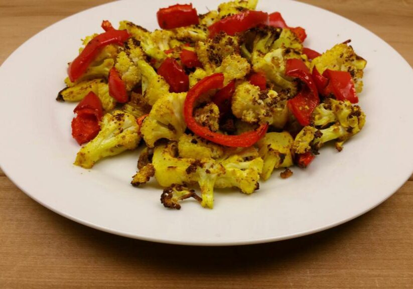 Geroosterde bloemkool en paprika uit de oven